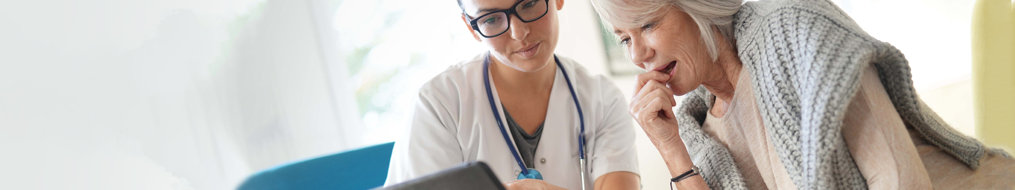 woman patient speaking with a provider